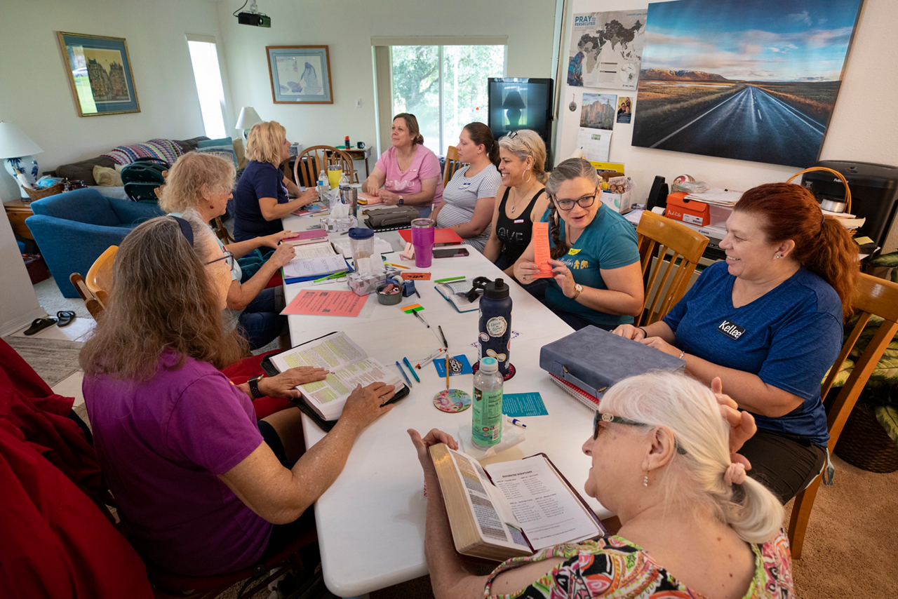 Molody's mom, Kathy Secrest, and Melody lead a Bible study with several neighborhood ladies. 
