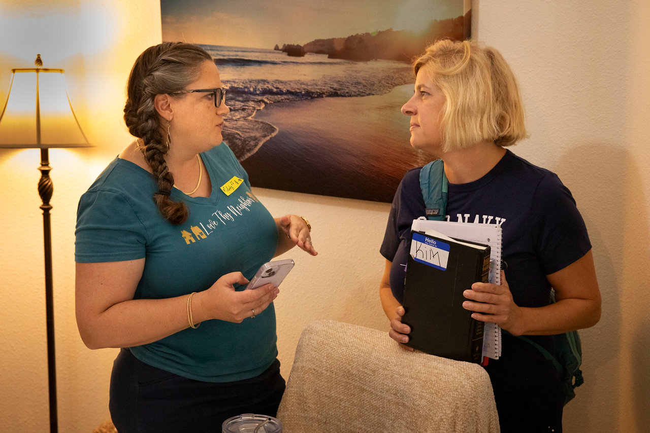 Molody's mom, Kathy Secrest, and Melody lead a Bible study with several neighborhood ladies. Melody is talking with Kim Black after the study. 