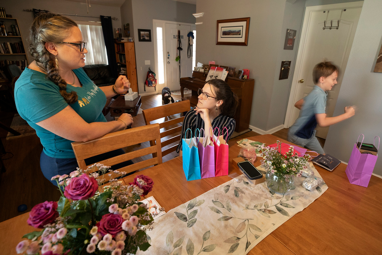 Melody with Sami Stevens. Melody mentors Sami, and they are good friends. They made cookies together to give to neighbors and put together gift bags. 