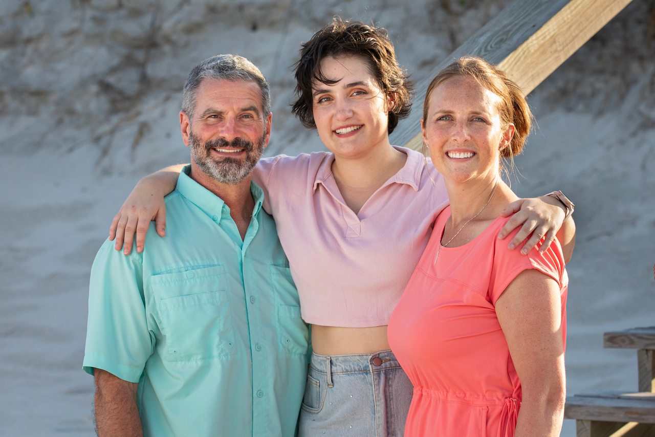Jennifer Vanover, attorney with FLAG ministry. Jen with stepdaughter Hannah and husband Mike at the beach. 