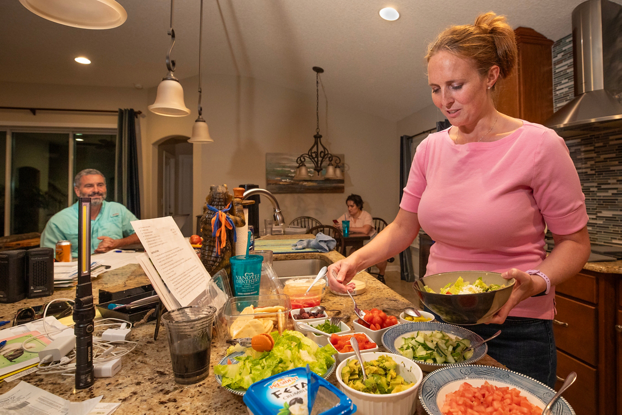 Jennifer Vanover, attorney with FLAG ministry. Jen who enjoys cooking working in her kitchen, preparing dinner after getting home from the beach. 
