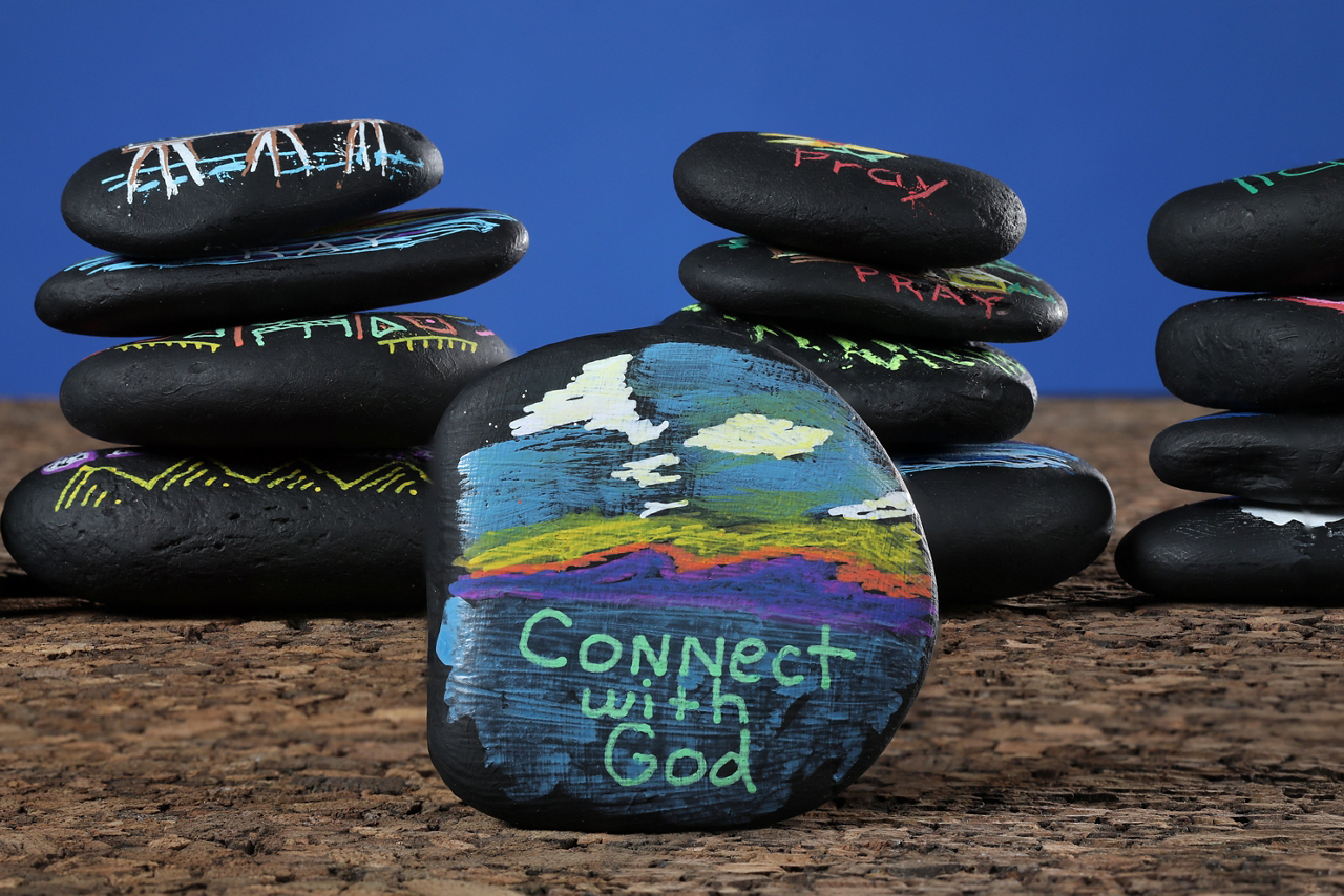 "Why do we pray" article illustrations using painted river rocks. 