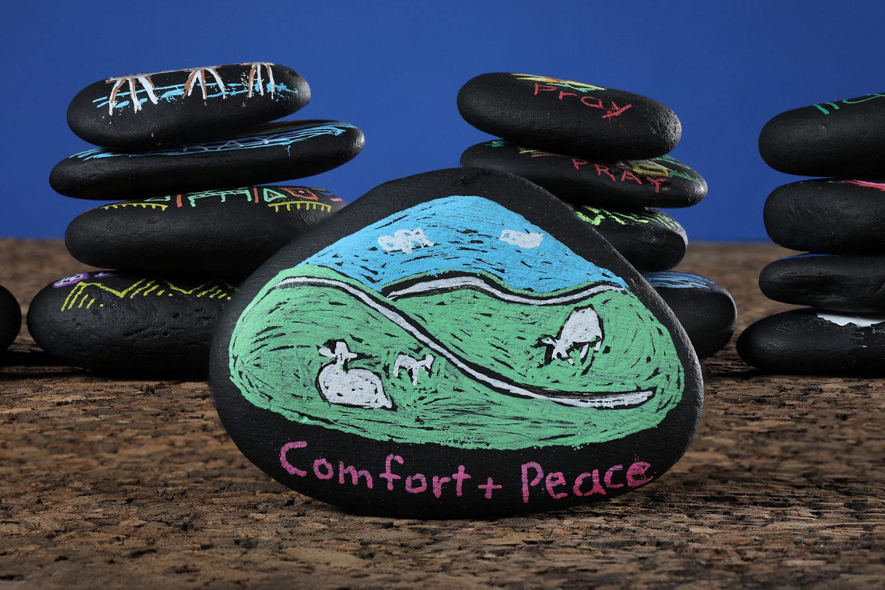 "Why do we pray" article illustrations using painted river rocks. 