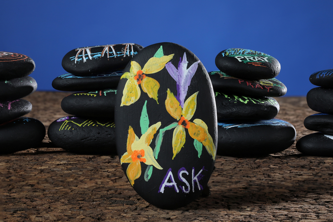 "Why do we pray" article illustrations using painted river rocks. 