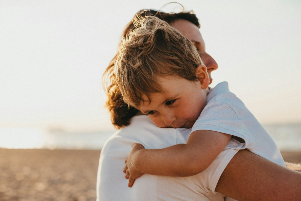 Father holding young son for a photoshoot