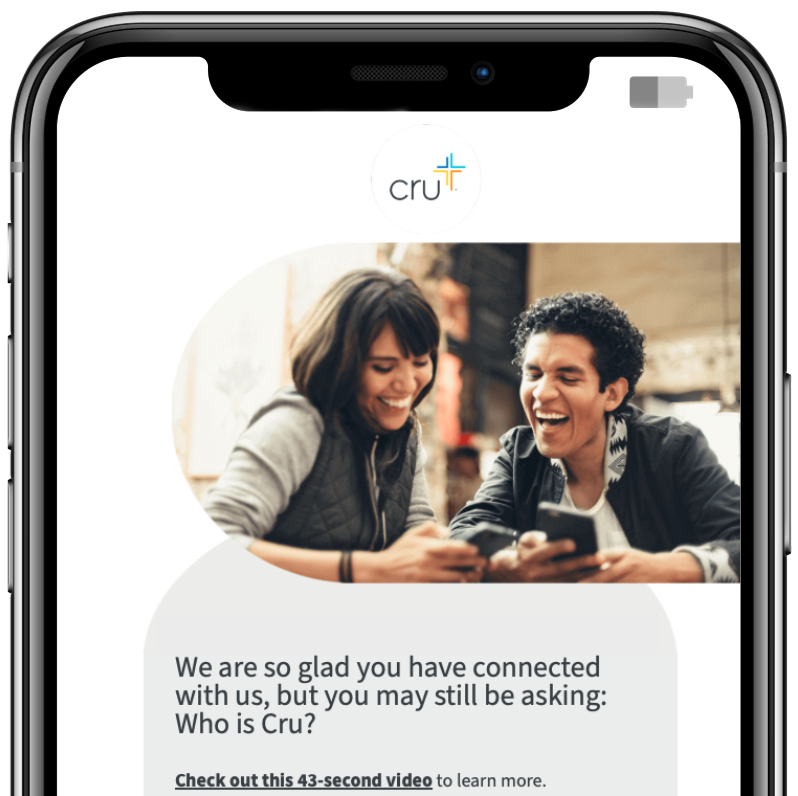 Smartphone showing an open messaging app and test messages with Cru.