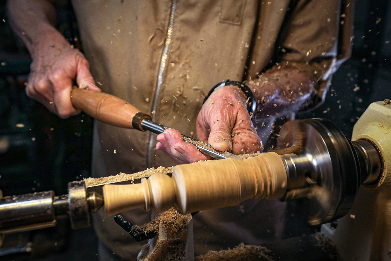 man working with wood