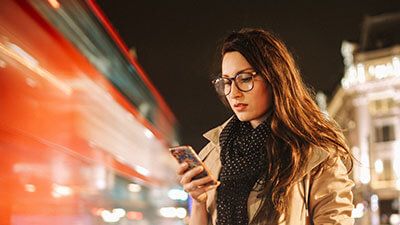 a woman looking at her phone