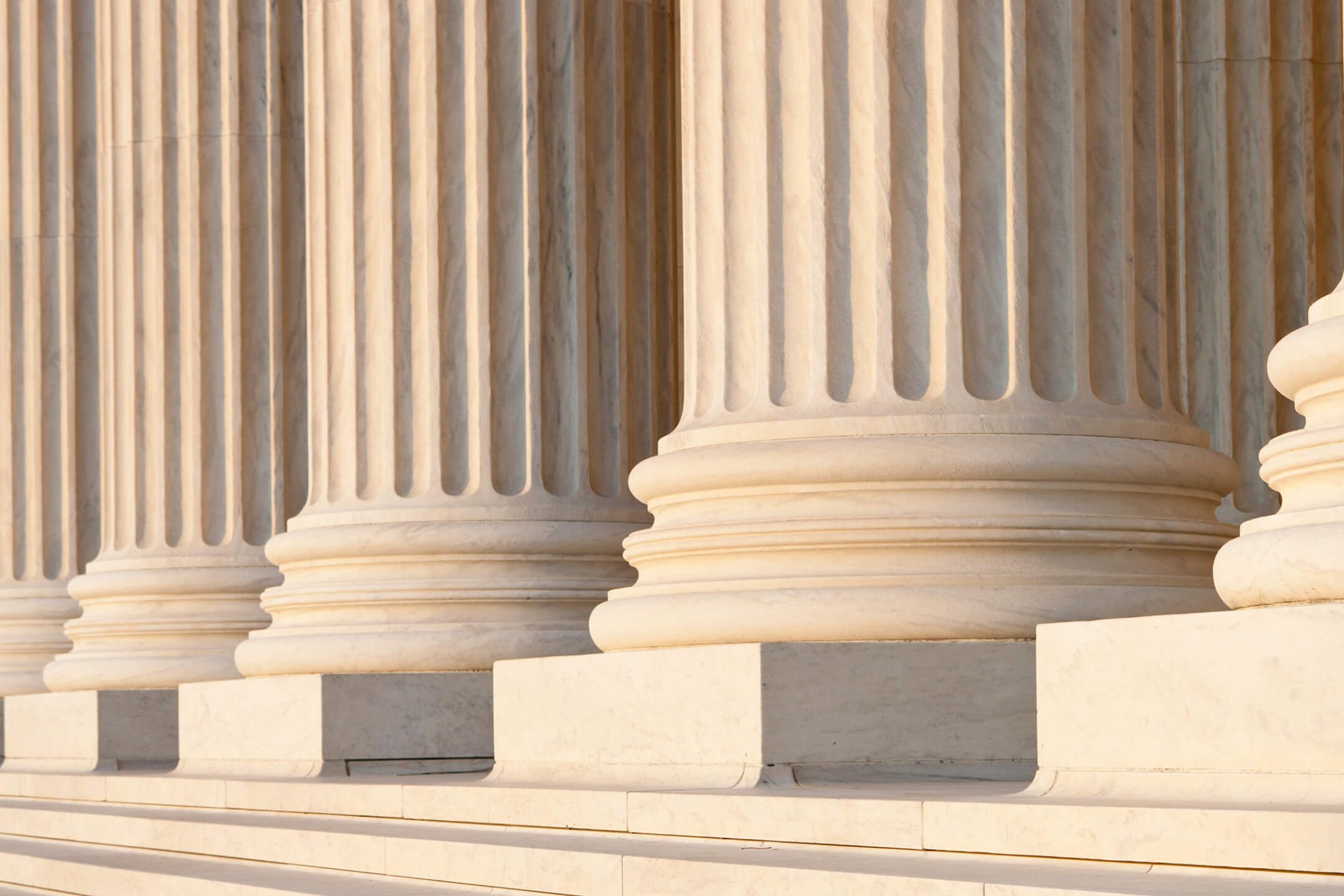 Washington DC Architectural detail of columns and marble steps. Critical focus on middle column.