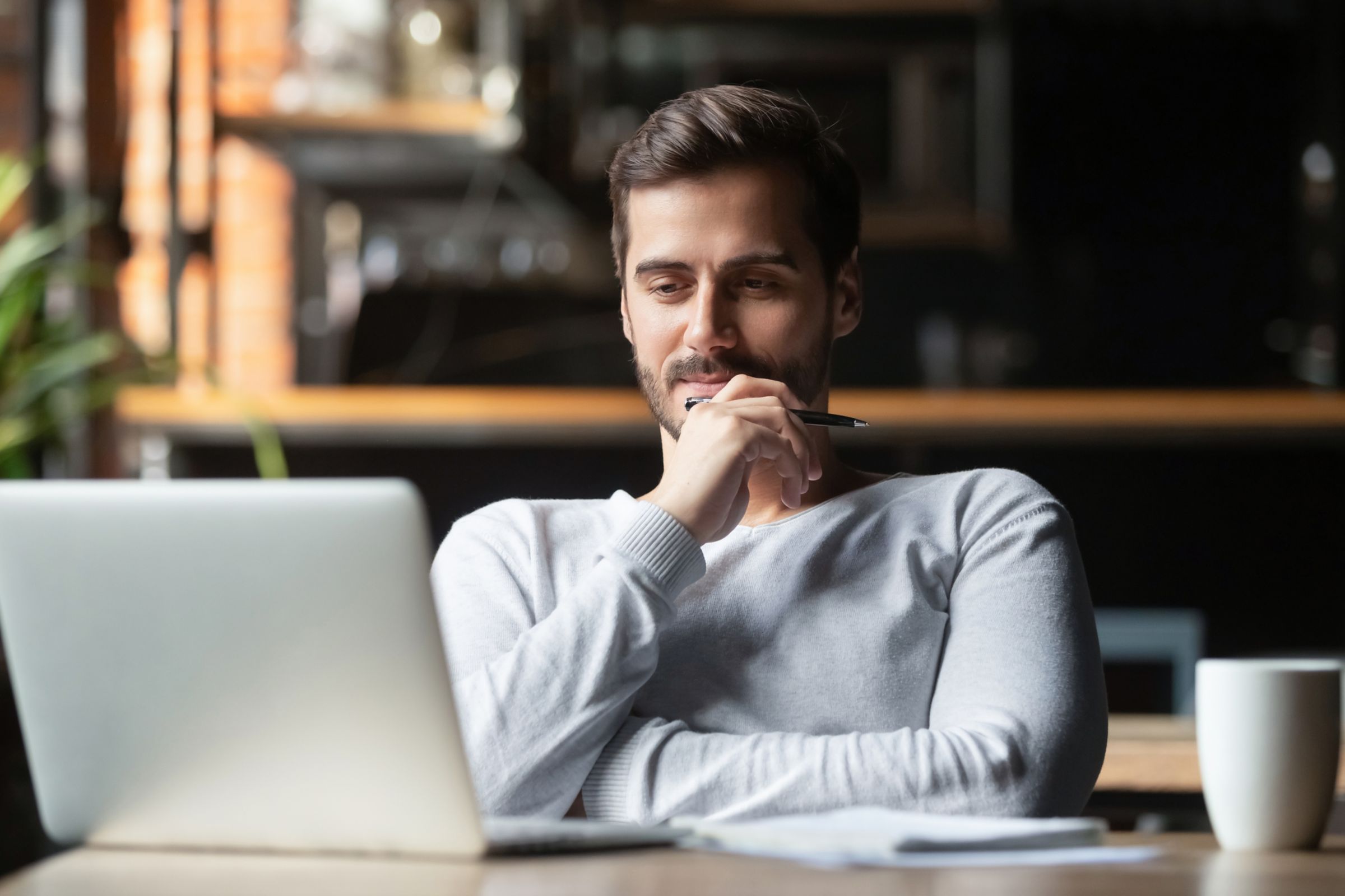 man looking at computer