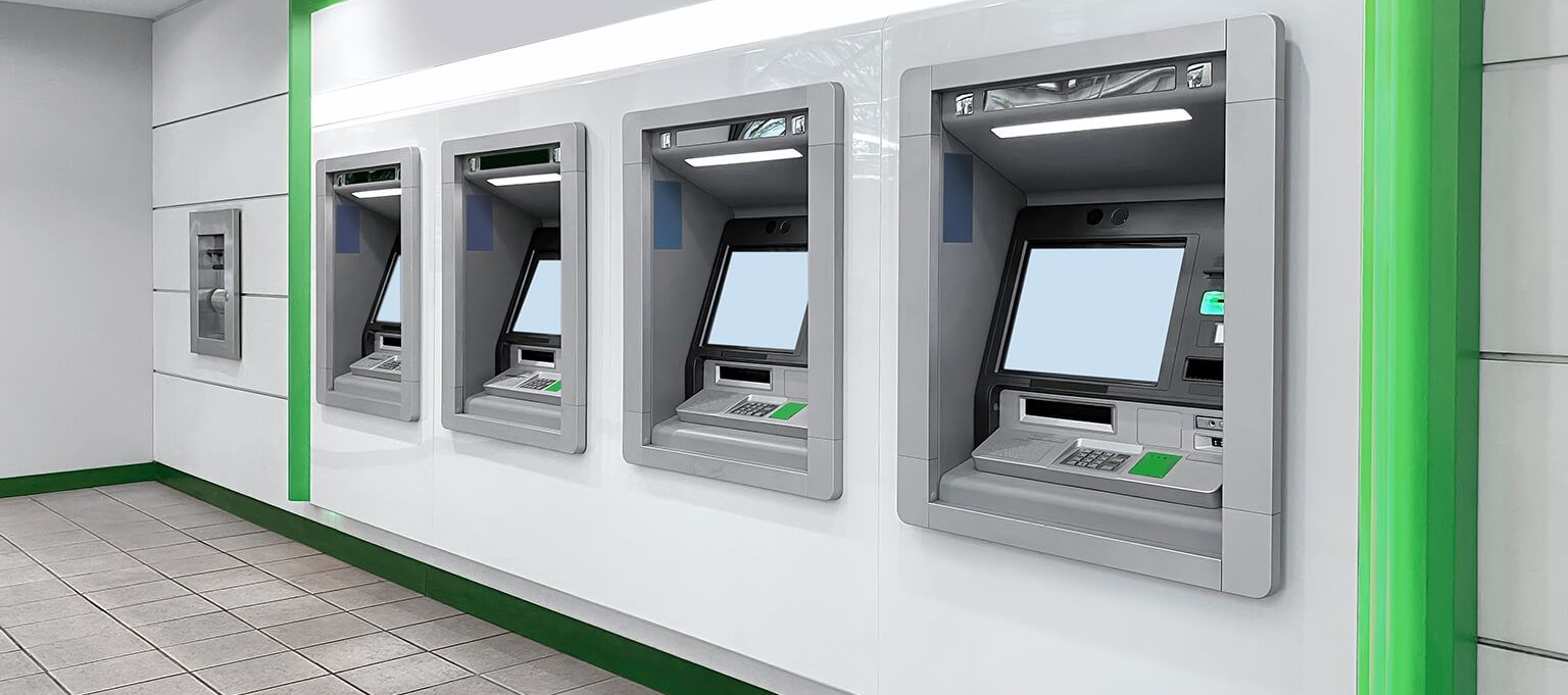 A group of ATMs in a row