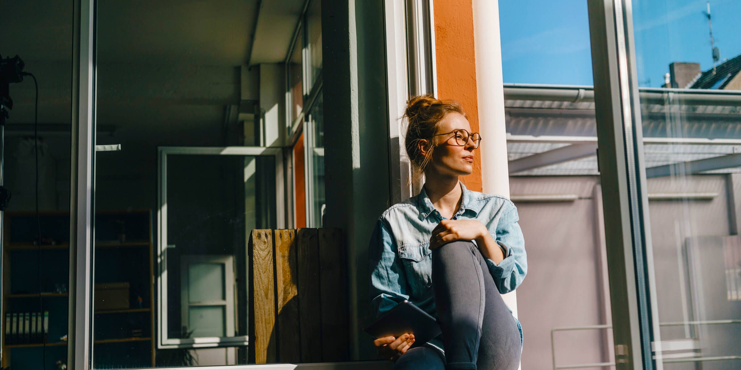 person sitting by a window