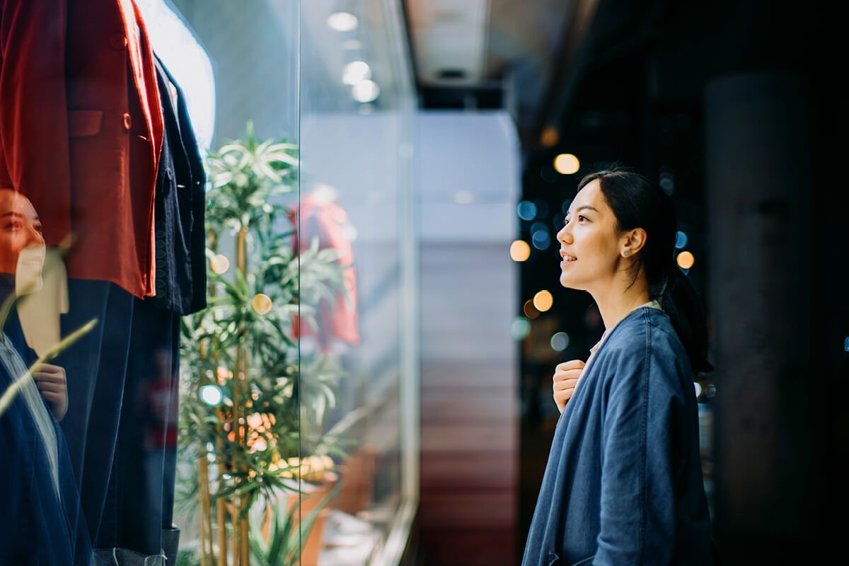 Woman making purchase with contactless pay