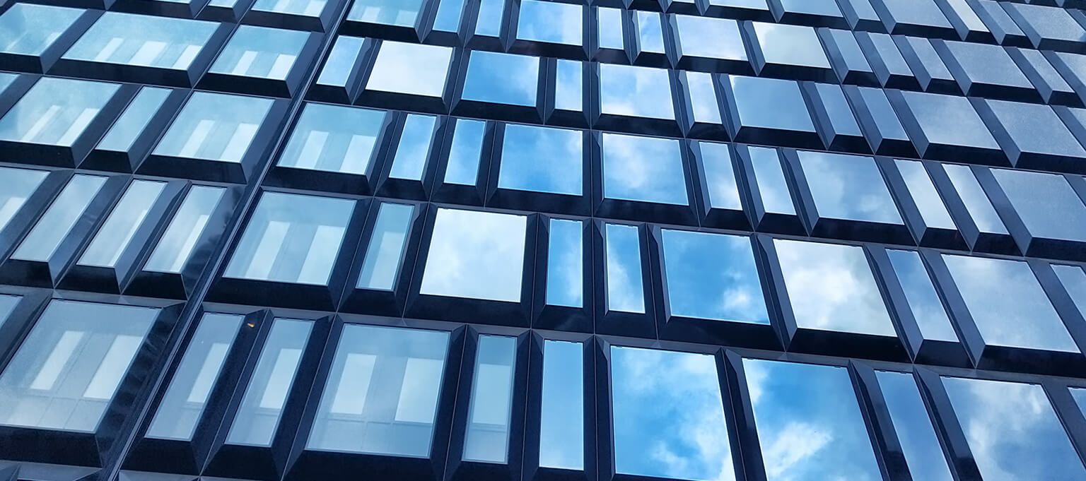 Close up image of a modern glass building