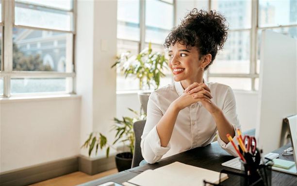 Smiling woman looking at phone