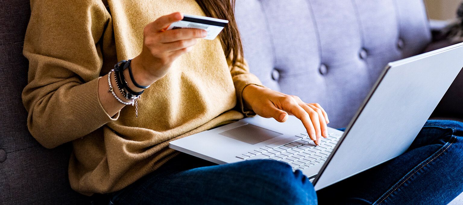 fiserv woman shopping home laptop
