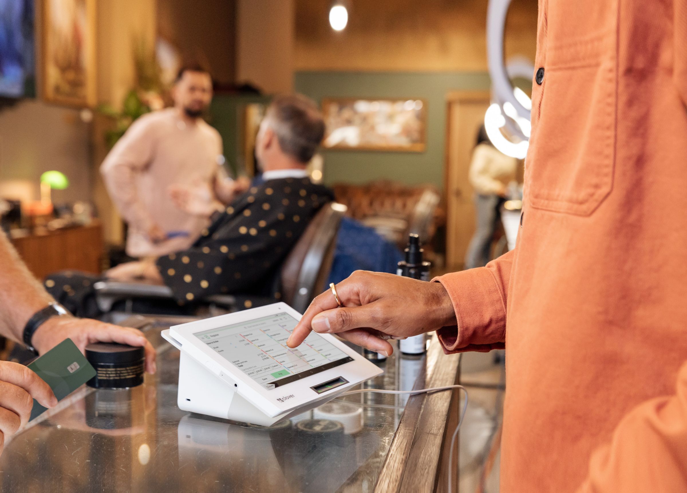 Clover device being used in a barber shop