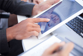 a close-up of a person using a tablet