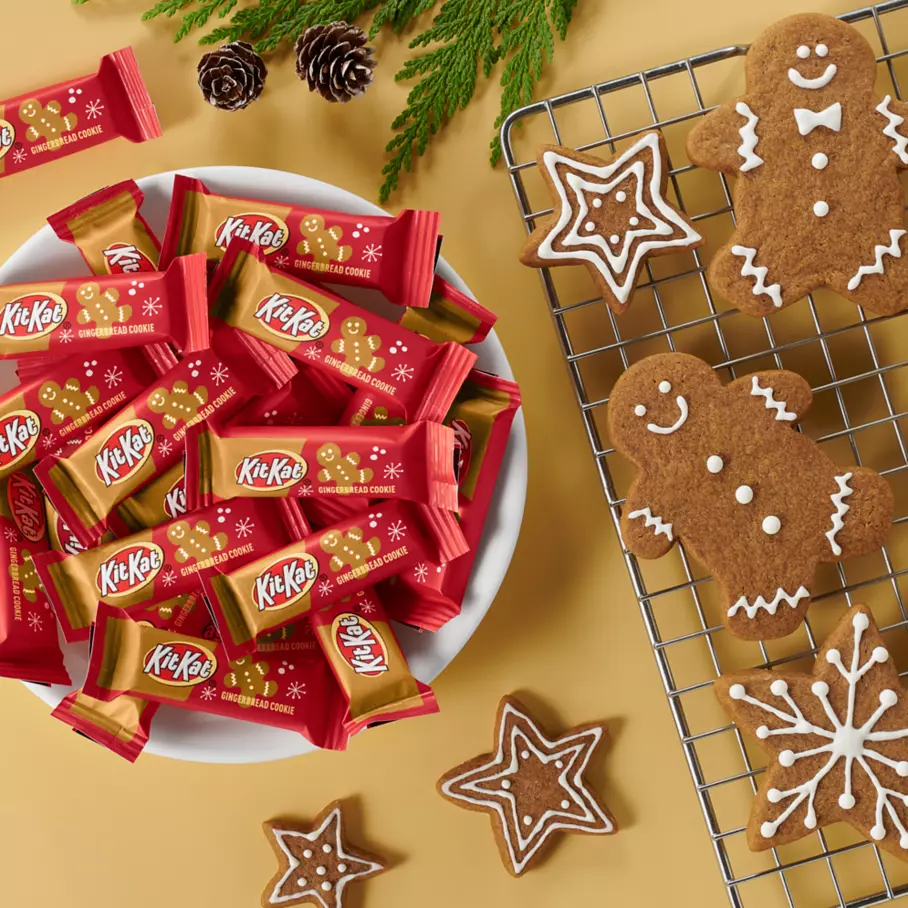 KIT KAT® Gingerbread Cookie Candy Bars in bowl surrounded by decorated cookies