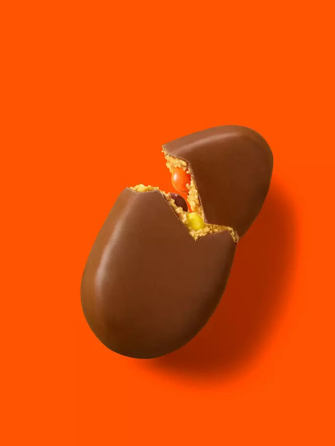 REESE'S STUFFED WITH PIECES Milk Chocolate Peanut Butter Egg, 1.1 oz - Out of Package