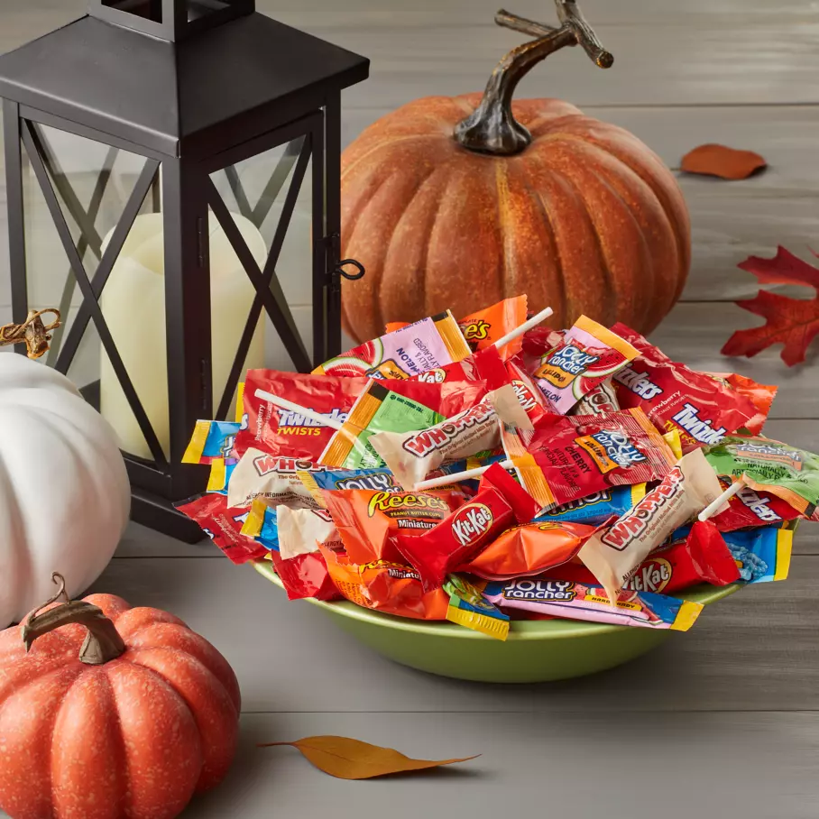 Assorted Hershey Halloween Candy inside bowl on porch