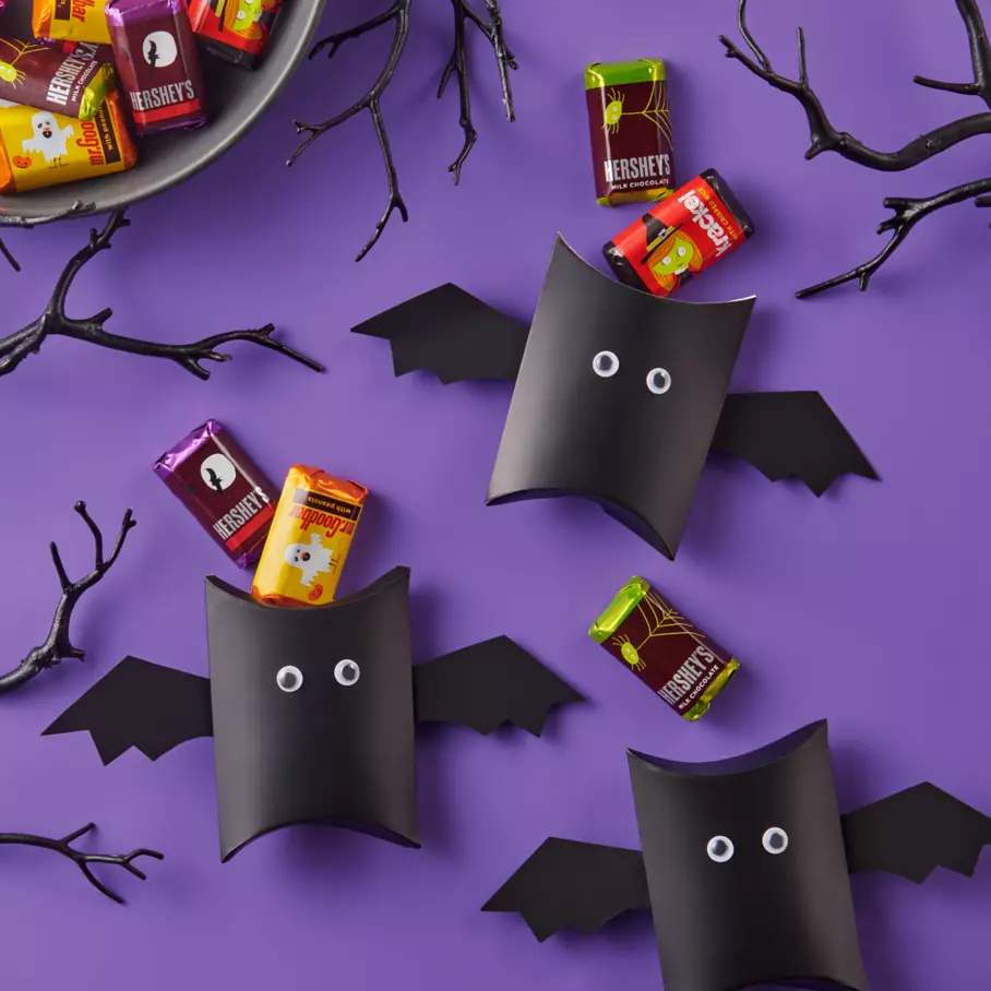 HERSHEY'S Halloween Miniatures surrounded by bats