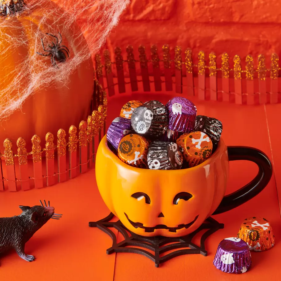 REESE'S Miniatures Peanut Butter Cups inside pumpkin mug