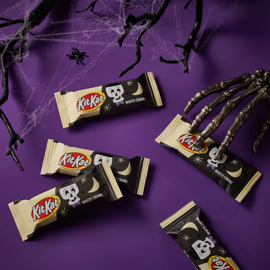 KIT KAT® Breaking Bones Candy Bars on halloween themed background