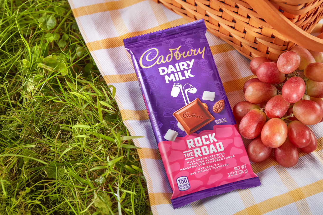 CADBURY Rock The Road Candy Bar beside picnic basket