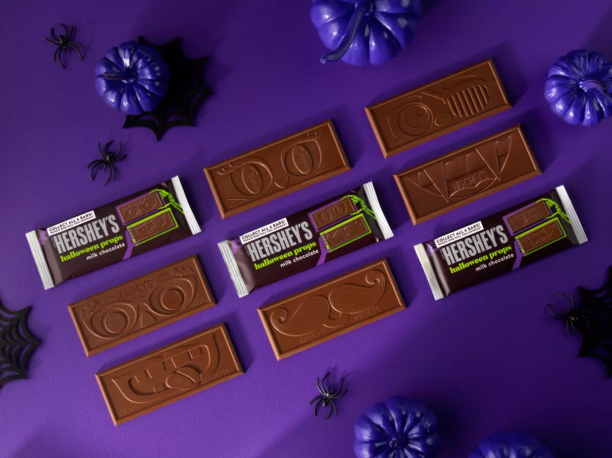 Wrapped and unwrapped HERSHEY'S Halloween Props Milk Chocolate Candy Bars