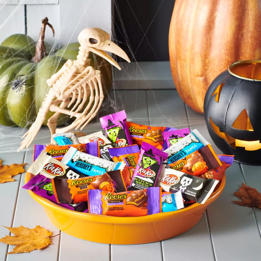 Assorted Hershey Halloween Candies inside bowl on porch