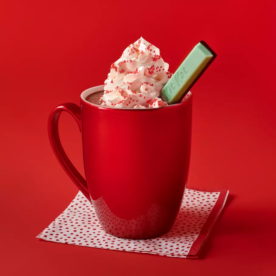 KIT KAT® DUOS Candy Bar inside mug of hot cocoa