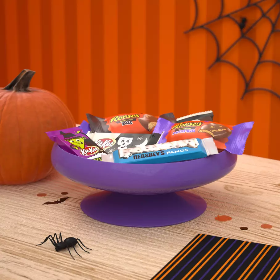 Assorted Hershey Candies inside halloween bowl