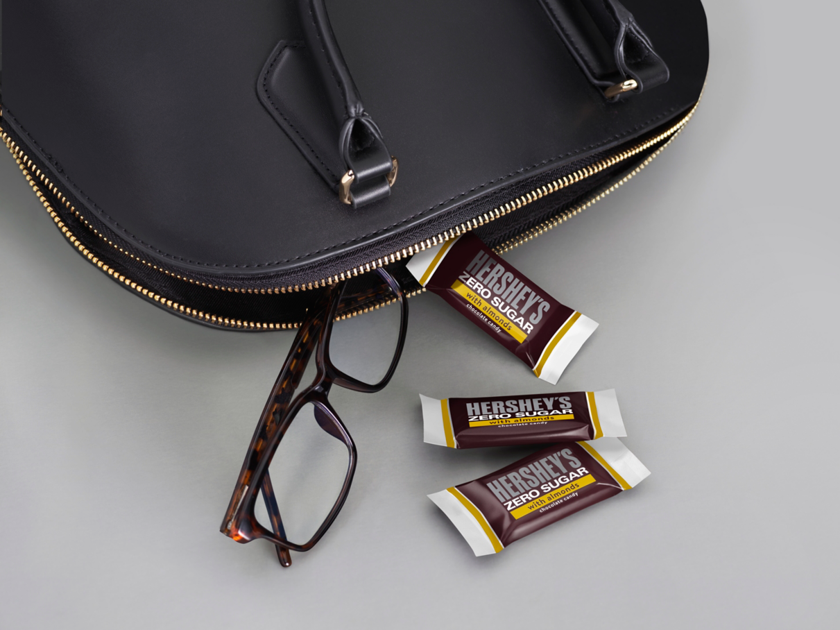 HERSHEY'S zero sugar candy beside purse