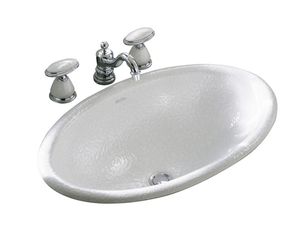 silver rimmed bathroom sink