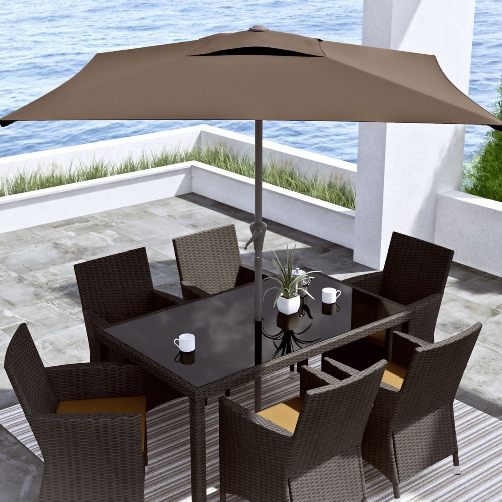 brown patio set with umbrella