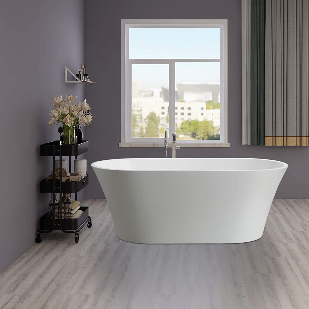 Freestanding acrylic bathtub with polished chrome pop-up drain. 6809