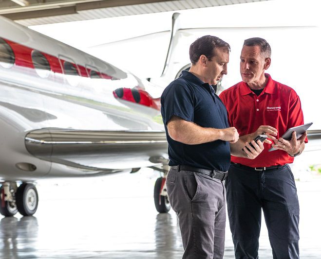 Business Jet Service check on tablet
