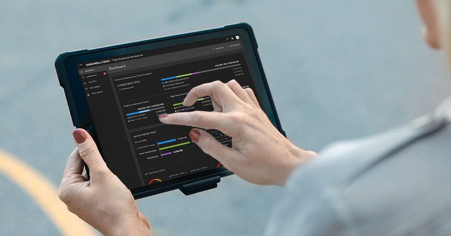 A person holding a tablet device