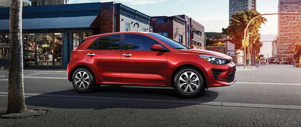 2023 Rio 5-Door in red, side view of passenger side