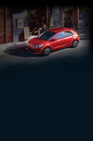 2023 Rio 5-Door in red, front driver's side 3-quarter view