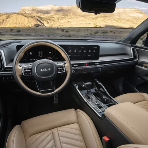 2024 Kia Sorento interior, driver view, with brown leather seats and steering wheel trim