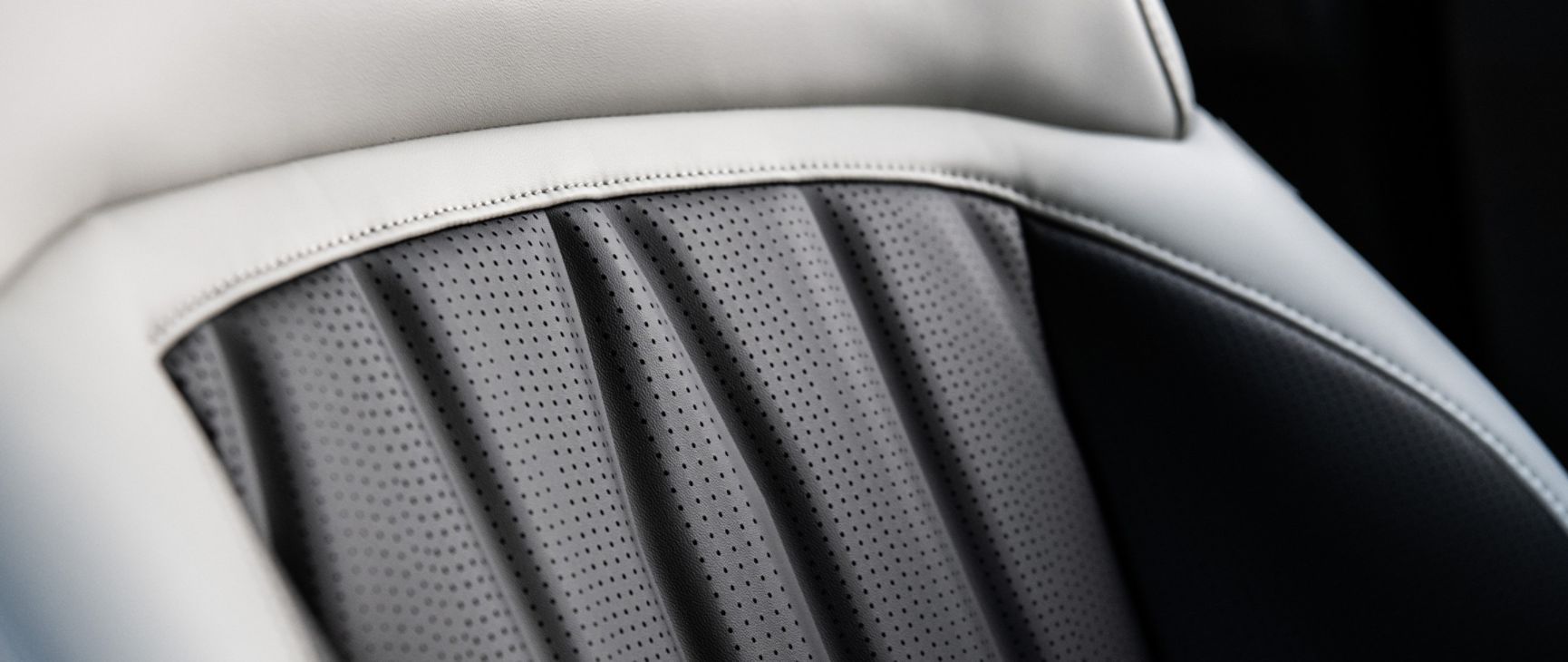 Close up photo of the seating patterns and premium material of seats in the Kia