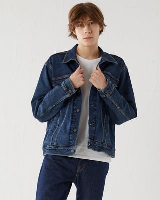 black denim jacket with blue jeans