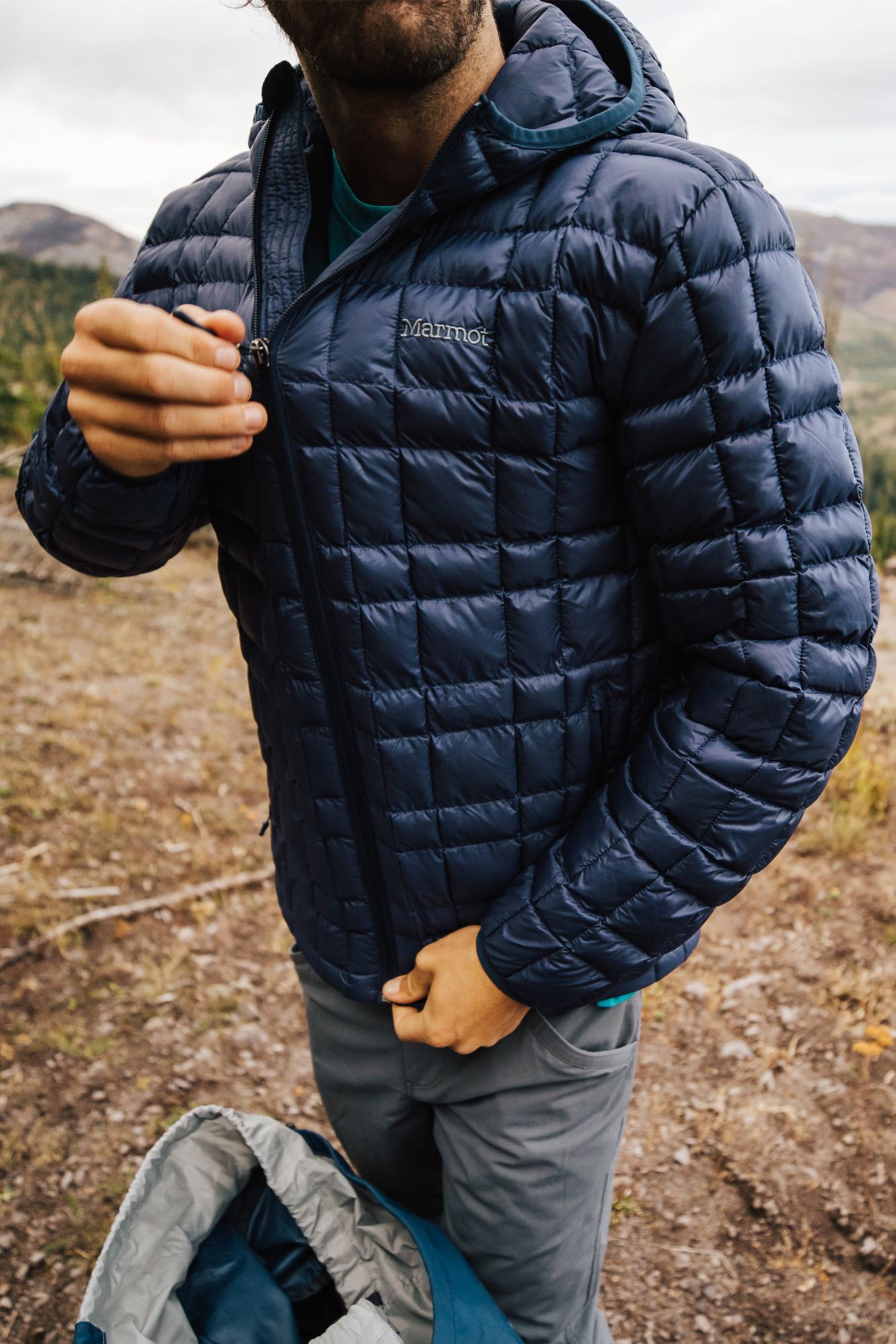 black puffer with fur hood