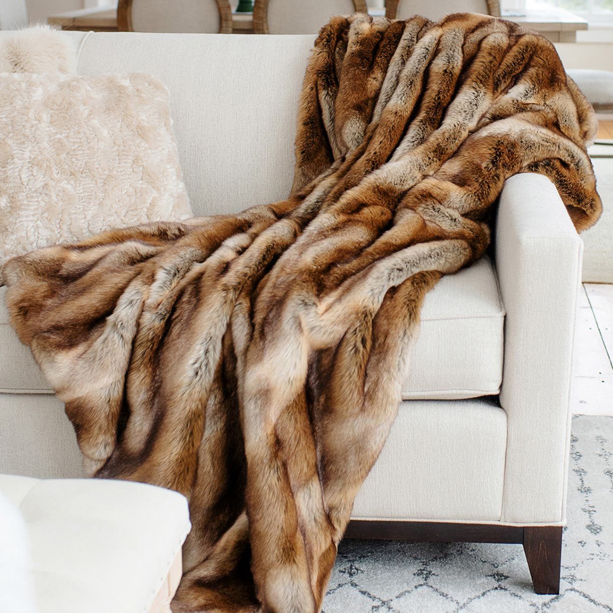 Stay Cozy with Faux Fur Throws & Pillows