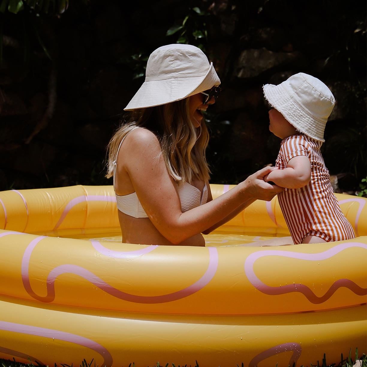 Towels & Inflatable Pools Feat. Pool Buoy from $25  N 