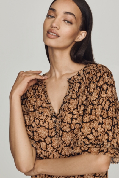 Pintuck Short-Sleeve Swing Top | Nuuly