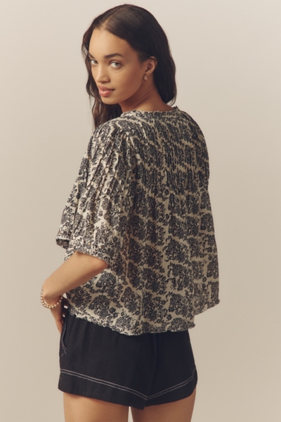 Pintuck Short-Sleeve Swing Top | Nuuly