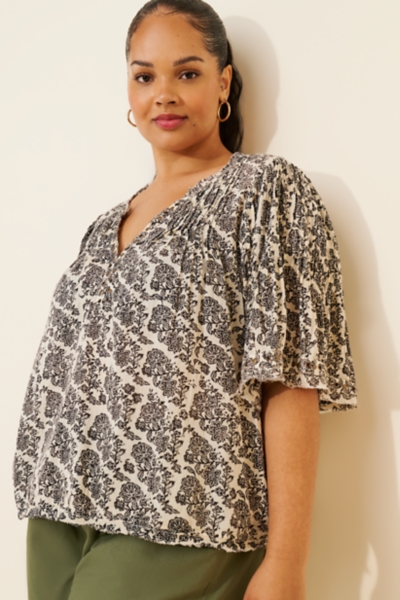 Pintuck Short-Sleeve Swing Top | Nuuly